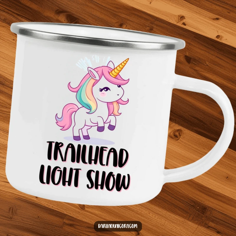 Funny camping mug displaying a unicorn creating a dazzling light show from its horn, perfect for outdoor magic.