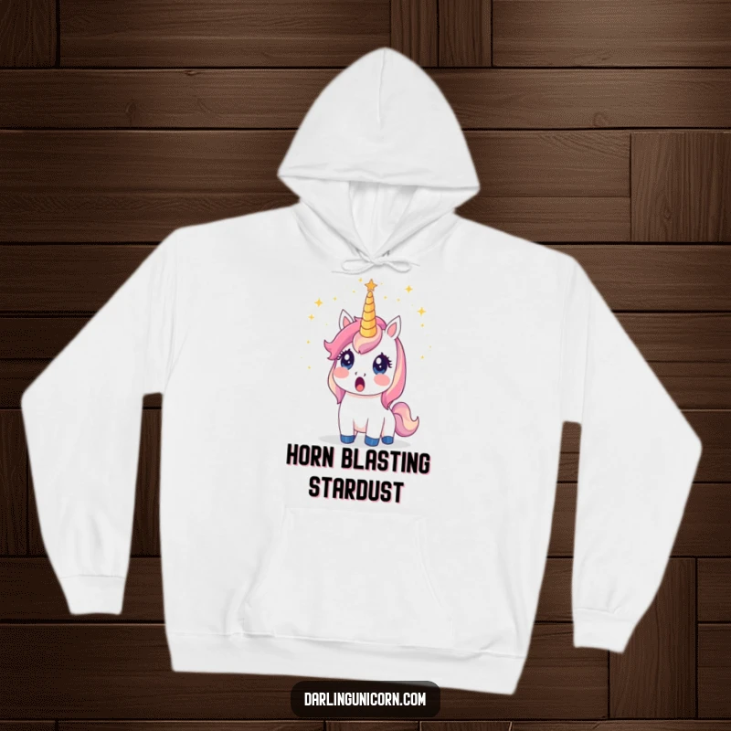 Funny unicorn hoodie showing a surprised unicorn with its horn emitting a spectacular shower of stardust, magical and cozy.