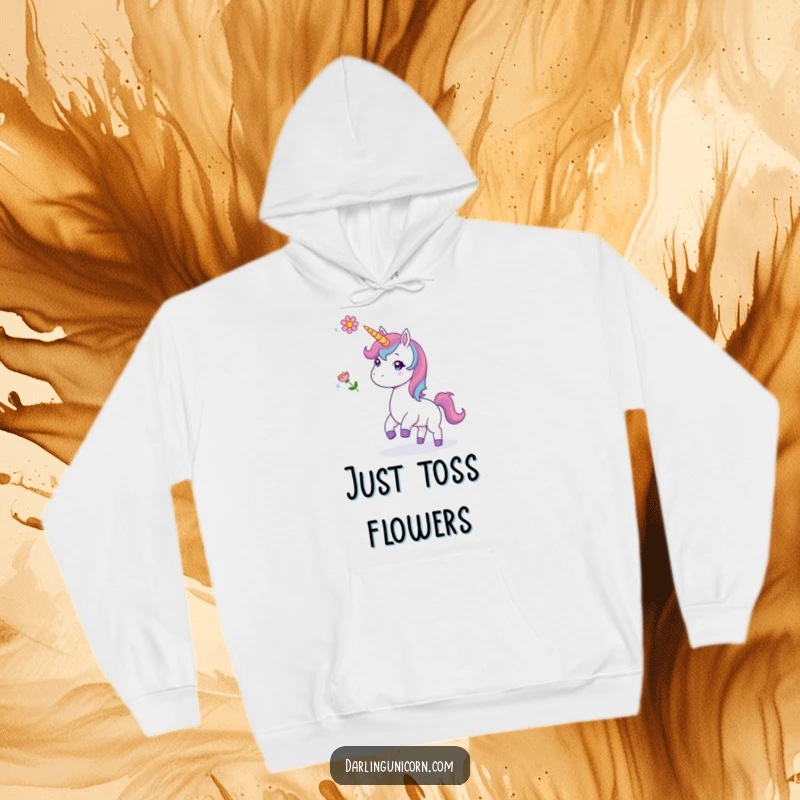 Funny hoodie featuring a unicorn playfully tossing a flower, offering warmth and a sense of whimsical joy.