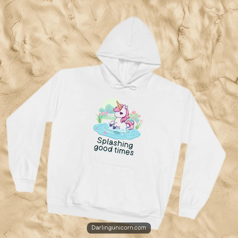 Funny Hoodie featuring a unicorn splashing playfully in a shimmering, magical pond, perfect for cozy enchantment.