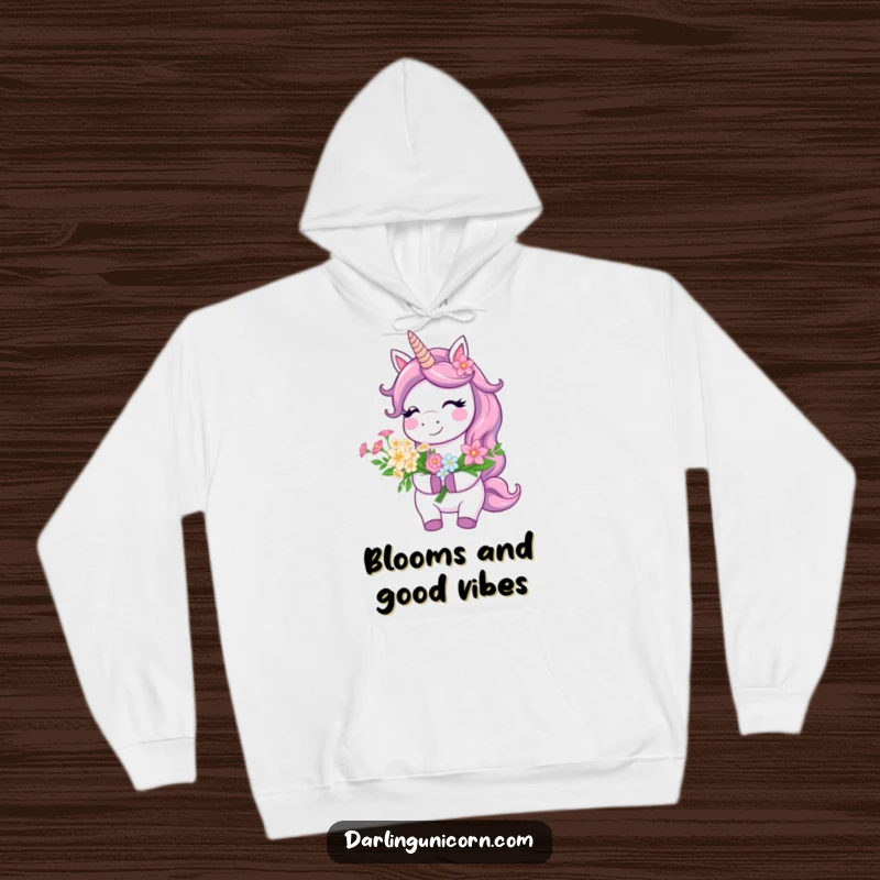 Funny Hoodie with a smiling unicorn holding a beautiful bouquet of flowers, radiating warmth and cheerful vibes.