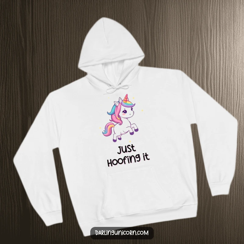 Funny Kawaii Unicorn Hoodie: A joyful unicorn with a rainbow mane gallops through a magical sky, bringing warmth and humor to your day.