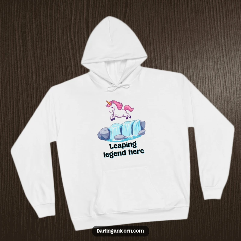 Funny Kawaii Unicorn Hoodie: A unicorn with a glowing horn leaps over a shimmering waterfall, bringing magical warmth and humor.