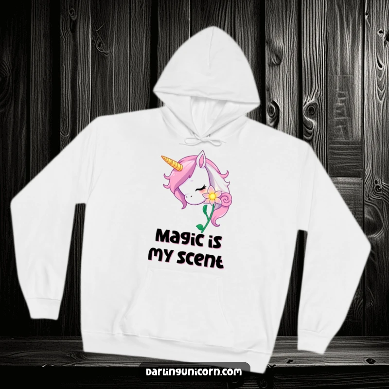 Funny unicorn hoodie depicting a curious unicorn nuzzling a radiant, magical flower, embodying gentle curiosity and enchantment.