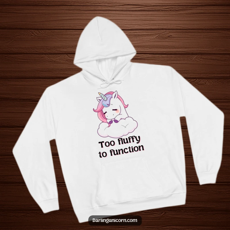 Funny hoodie featuring a contented unicorn nuzzling a soft cloud, radiating warmth and peaceful vibes, perfect for cozy relaxation.