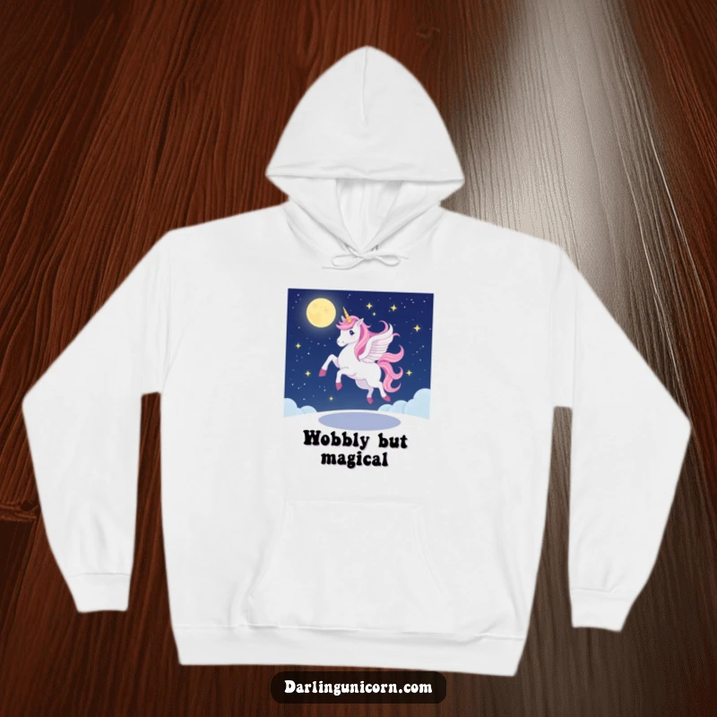 Funny unicorn hoodie depicting a unicorn doing a graceful, wobbly pirouette on a starlit night, perfect for cozying up with whimsical dreams.