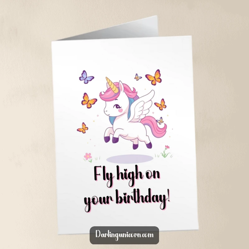 Funny Free Printable Birthday Card: Unicorn with wings playfully chasing butterflies, celebrating with joy, digital download.