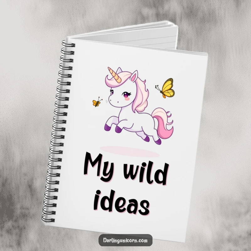 Funny notebook showing a unicorn happily playing tag with a butterfly, designed for capturing creative and playful thoughts.