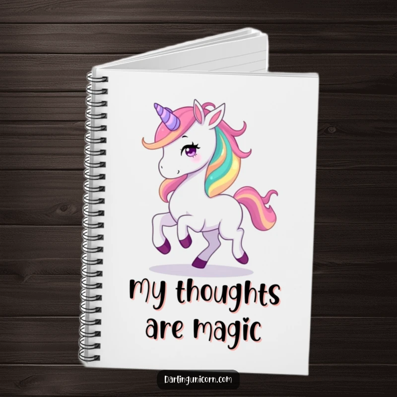 Funny notebook with a graceful unicorn prancing, its rainbow mane flowing, ready to capture magical thoughts and notes.