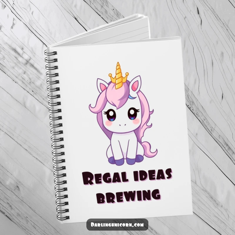 Funny notebook featuring a gentle unicorn balancing a tiny crown on its horn, perfect for writing royal thoughts and creative ideas.