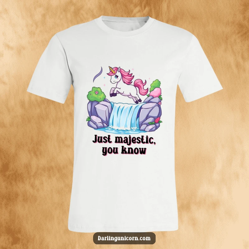 Funny t-shirt showcasing a dynamic unicorn mid-leap over a dazzling waterfall, symbolizing exhilaration and fantasy.