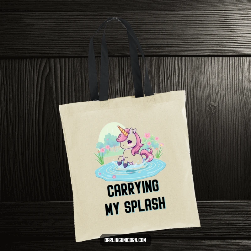 Funny Tote Bag showing a unicorn playfully splashing in a magical pond, perfect for carrying items with flair.